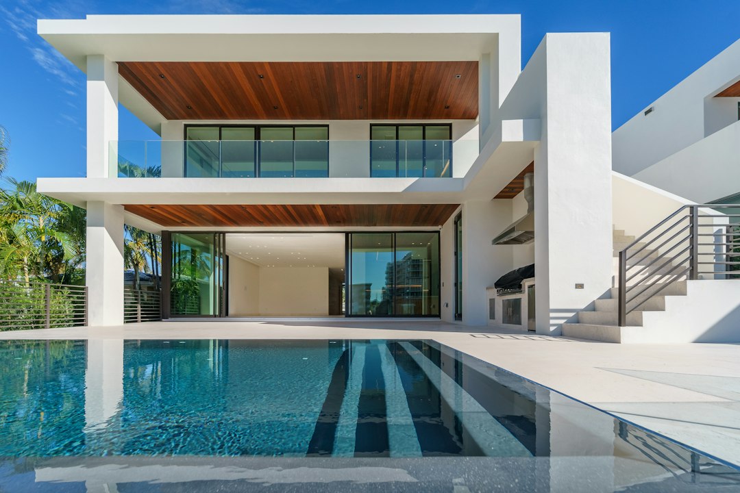 Contemporary villa with infinity pool at golden hour